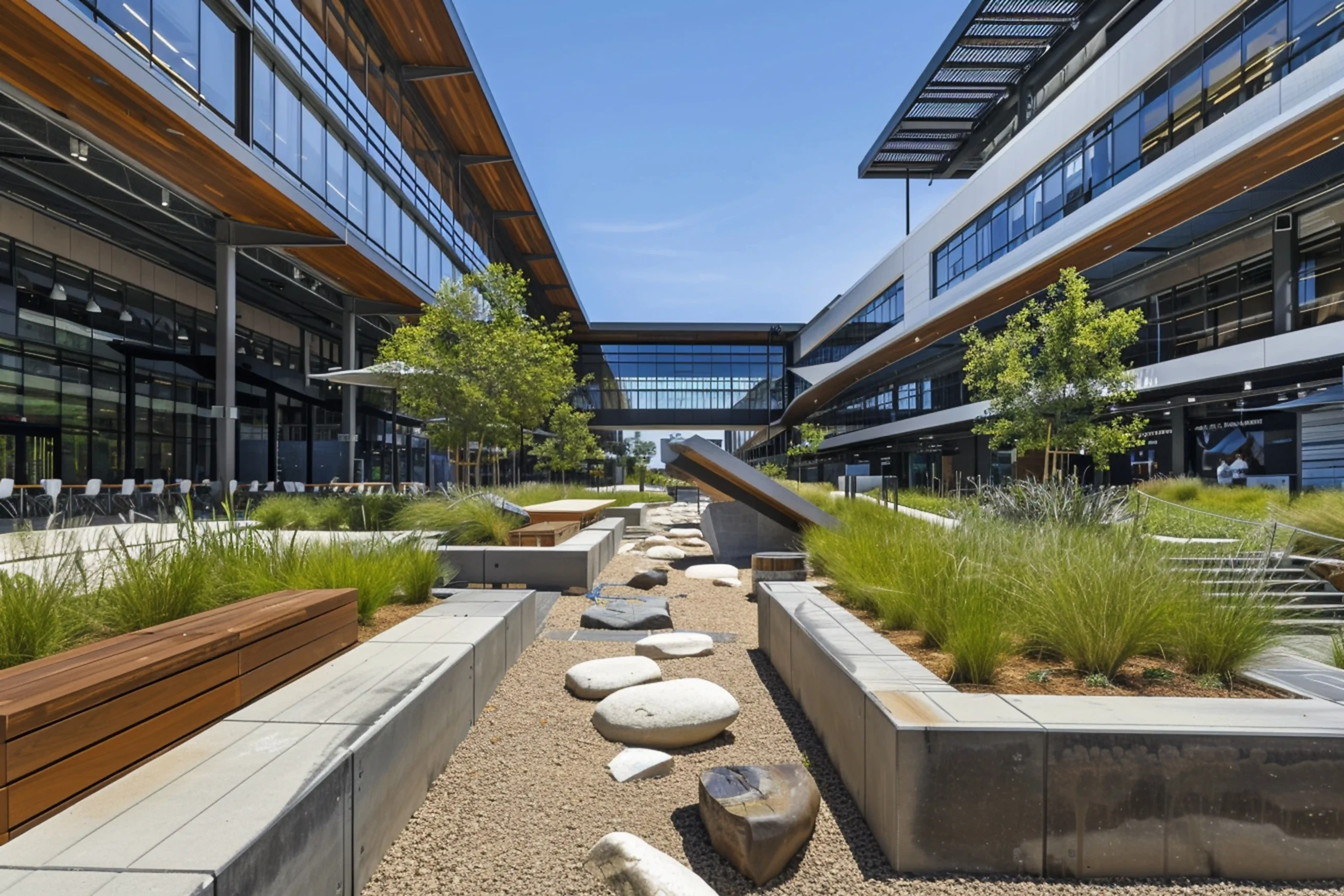 Modern commercial courtyard with ornamental grasses and hardscaping